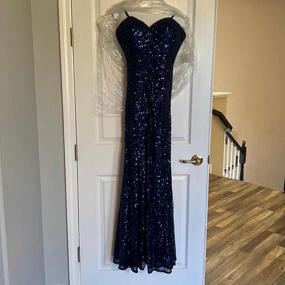 Blue sequenced evening gown.